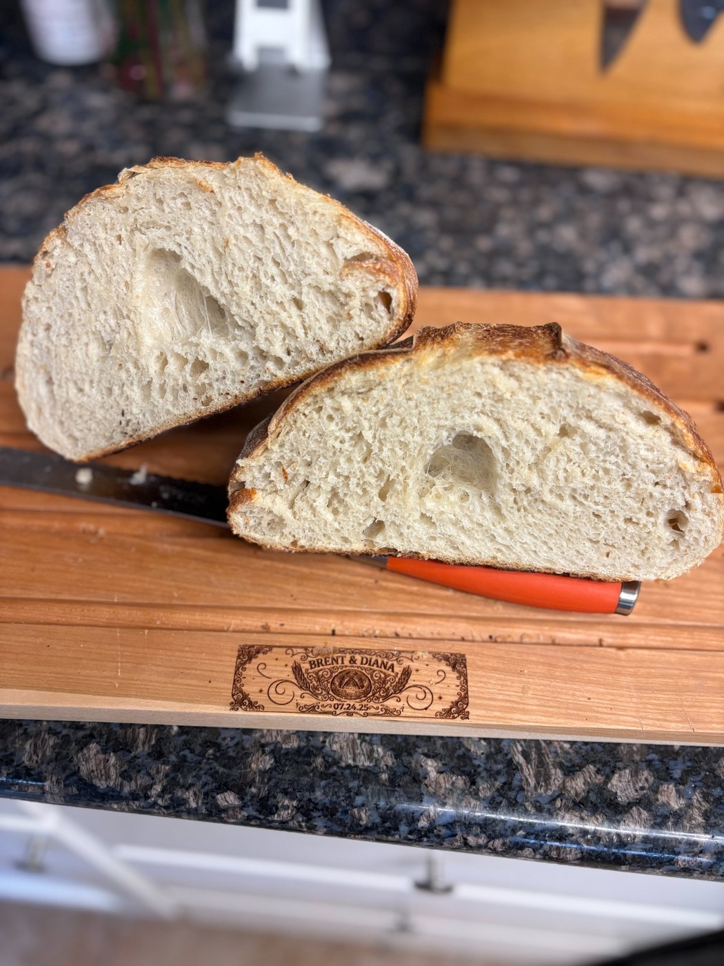 Two slices of sourdough bread on a wooden board